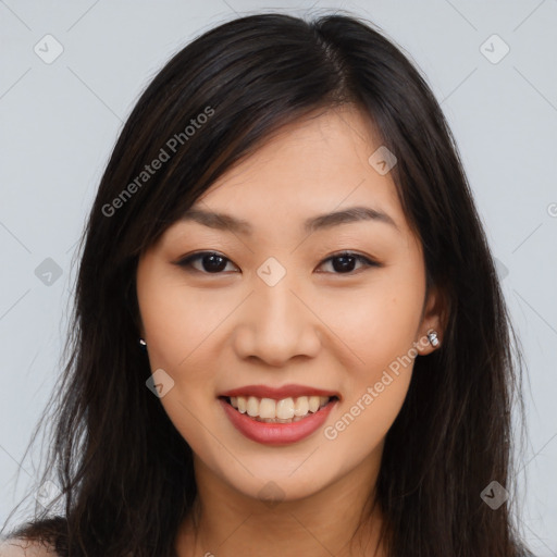 Joyful asian young-adult female with long  brown hair and brown eyes