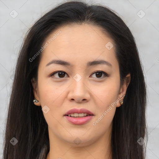 Joyful asian young-adult female with long  brown hair and brown eyes