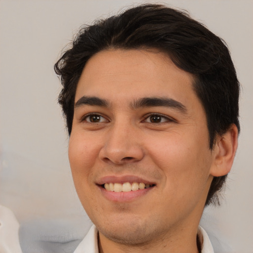 Joyful white young-adult male with medium  brown hair and brown eyes