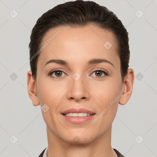 Joyful white young-adult female with short  brown hair and brown eyes