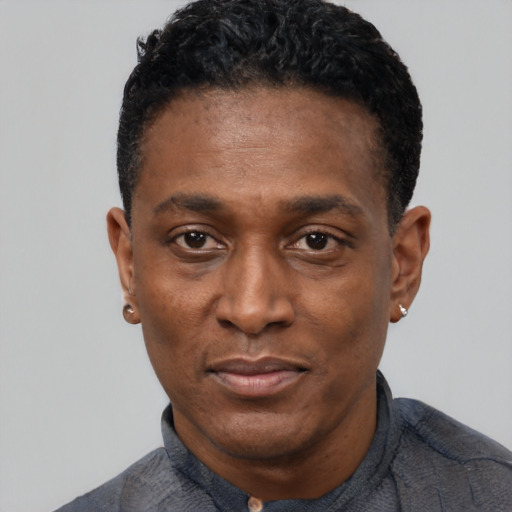 Neutral black adult male with short  black hair and brown eyes