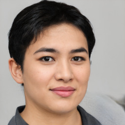 Joyful asian young-adult female with short  brown hair and brown eyes