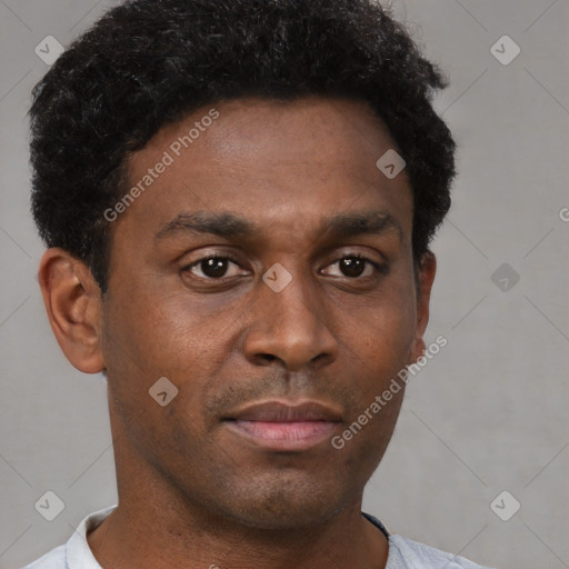 Neutral black young-adult male with short  brown hair and brown eyes
