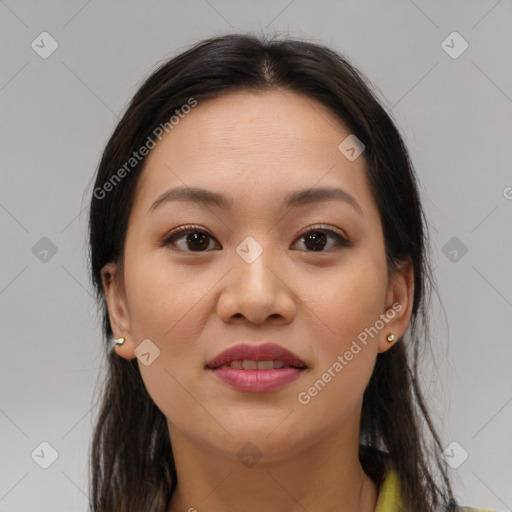 Joyful asian young-adult female with long  brown hair and brown eyes