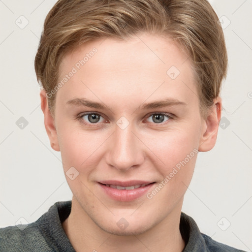 Joyful white young-adult female with short  brown hair and grey eyes