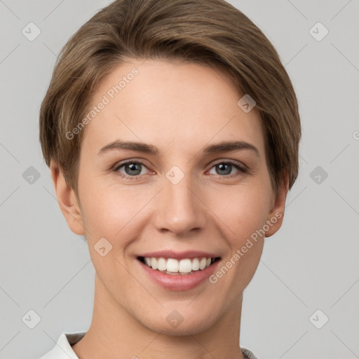 Joyful white young-adult female with short  brown hair and grey eyes