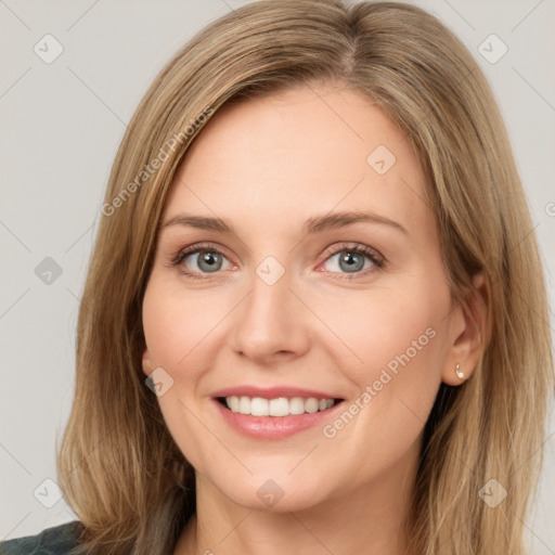 Joyful white young-adult female with long  brown hair and green eyes