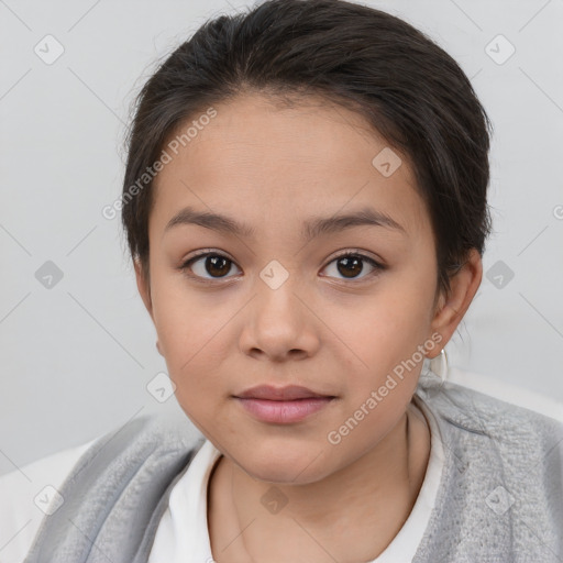 Joyful white child female with medium  brown hair and brown eyes