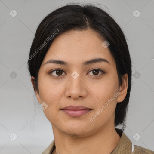 Joyful asian young-adult female with medium  black hair and brown eyes