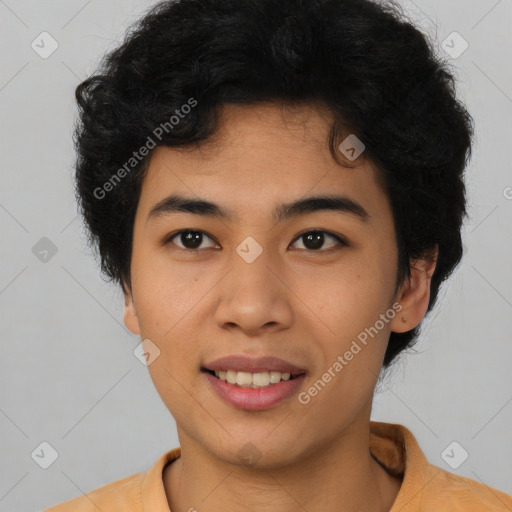 Joyful latino young-adult male with short  brown hair and brown eyes