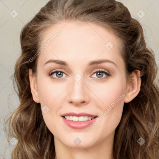 Joyful white young-adult female with long  brown hair and green eyes