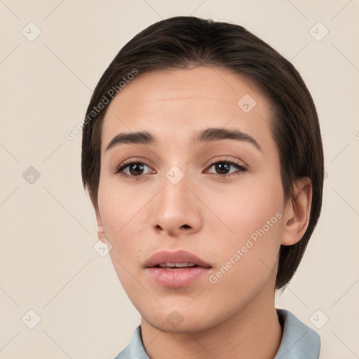 Neutral white young-adult female with short  brown hair and brown eyes