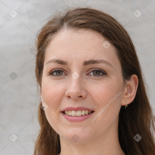 Joyful white young-adult female with long  brown hair and grey eyes