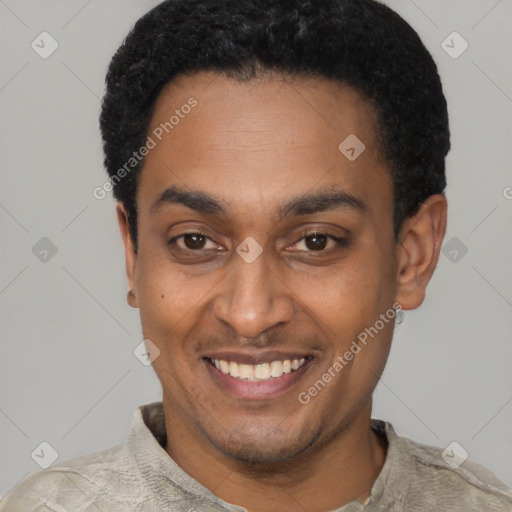 Joyful latino young-adult male with short  black hair and brown eyes