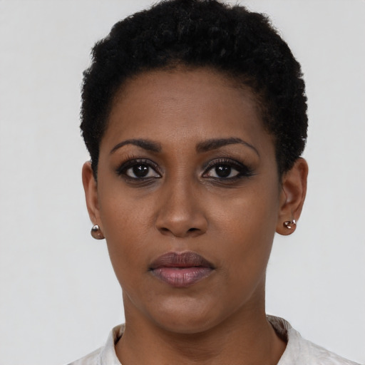 Neutral black young-adult female with short  black hair and brown eyes