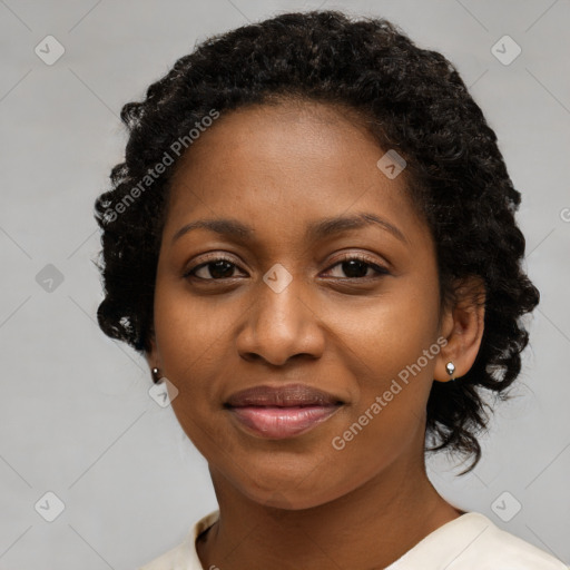 Joyful black young-adult female with medium  black hair and brown eyes