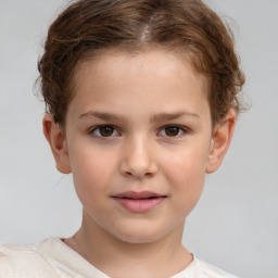 Joyful white child female with short  brown hair and brown eyes