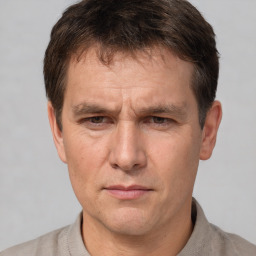 Neutral white adult male with short  brown hair and brown eyes