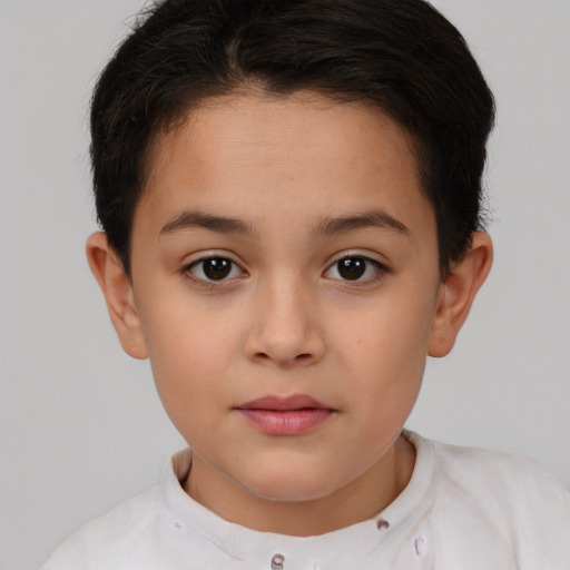 Joyful white child female with short  brown hair and brown eyes