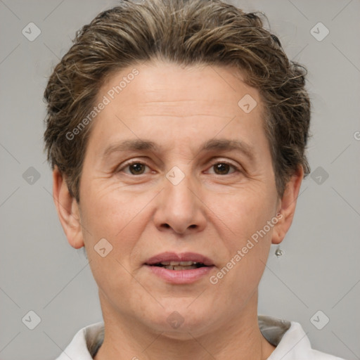 Joyful white adult female with short  brown hair and brown eyes