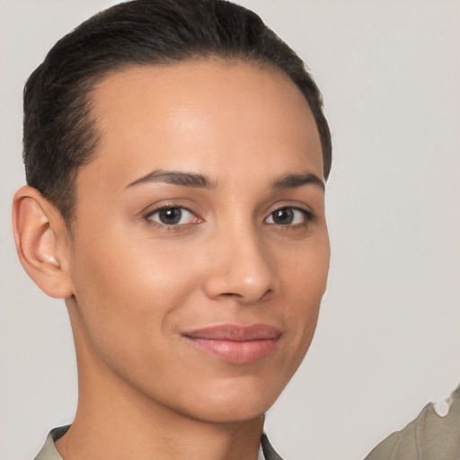 Joyful latino young-adult female with short  brown hair and brown eyes