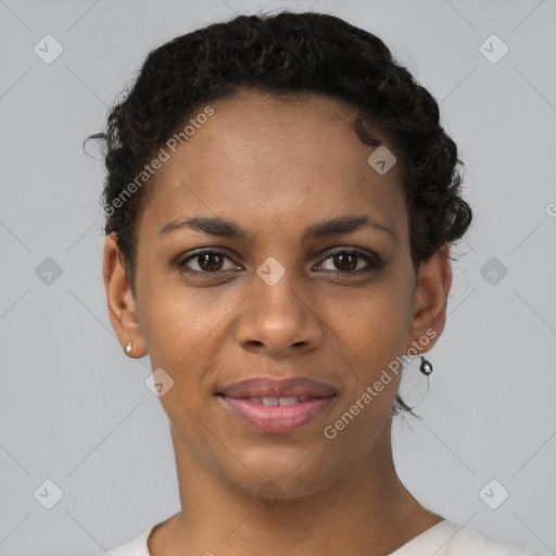 Joyful black young-adult female with short  brown hair and brown eyes