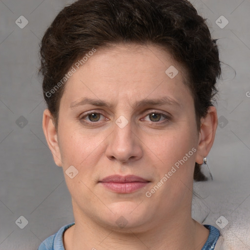 Joyful white adult female with short  brown hair and brown eyes