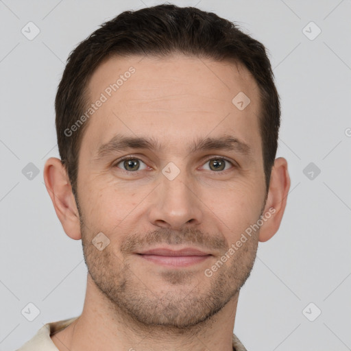 Joyful white adult male with short  brown hair and brown eyes