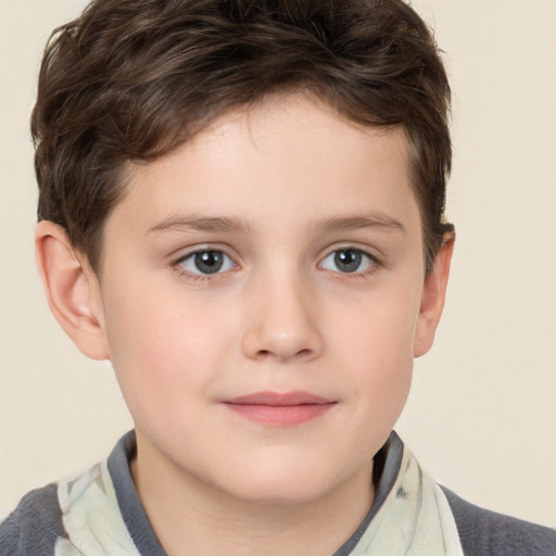 Joyful white child male with short  brown hair and brown eyes