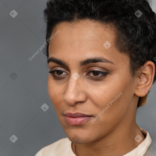 Joyful latino young-adult female with short  brown hair and brown eyes