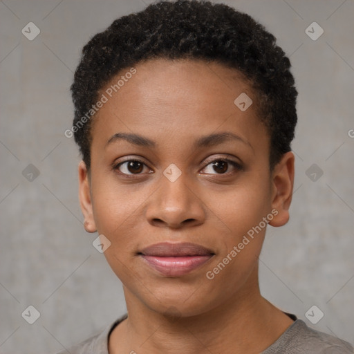 Joyful black young-adult female with short  black hair and brown eyes