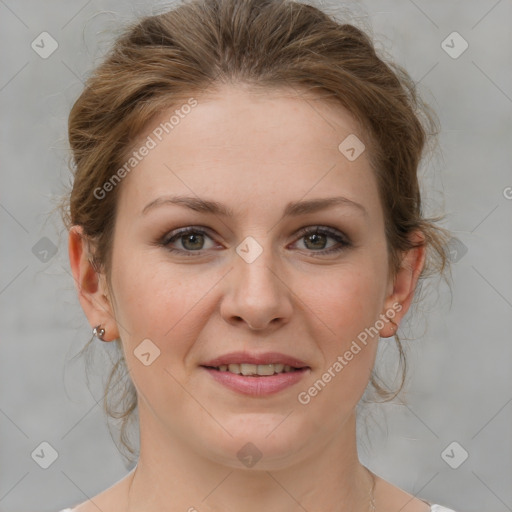 Joyful white young-adult female with medium  brown hair and grey eyes