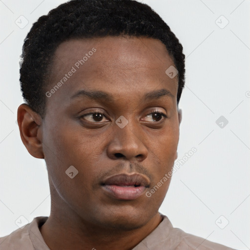 Neutral black young-adult male with short  brown hair and brown eyes
