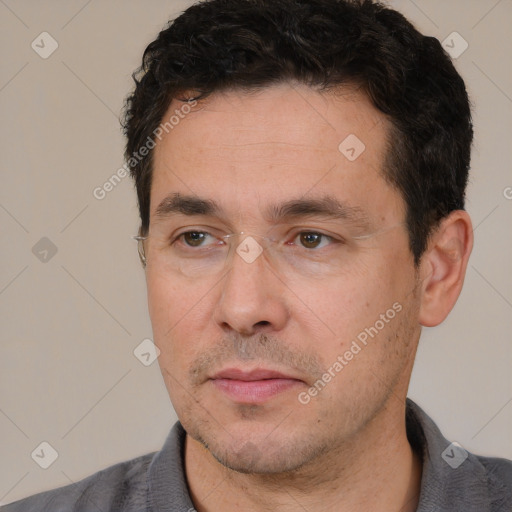 Neutral white adult male with short  black hair and brown eyes