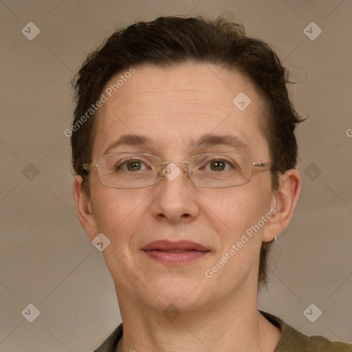 Joyful white adult female with short  brown hair and grey eyes