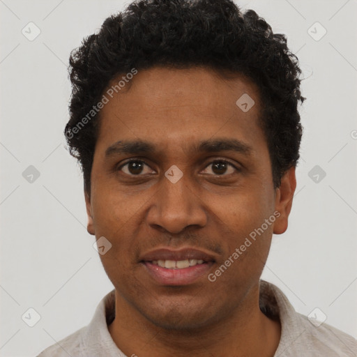 Joyful black young-adult male with short  black hair and brown eyes