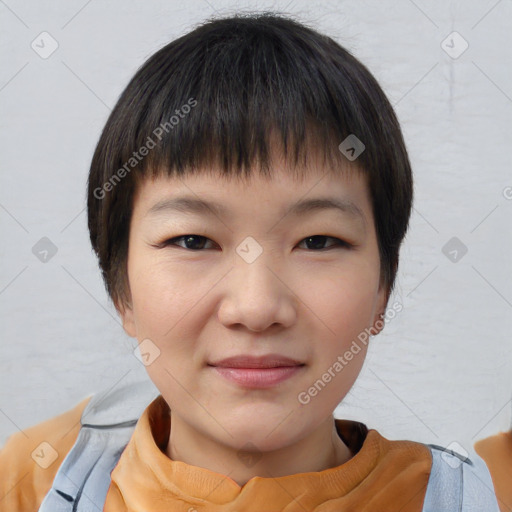 Joyful white child female with short  brown hair and brown eyes