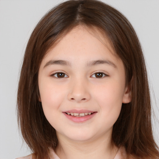 Joyful white child female with medium  brown hair and brown eyes