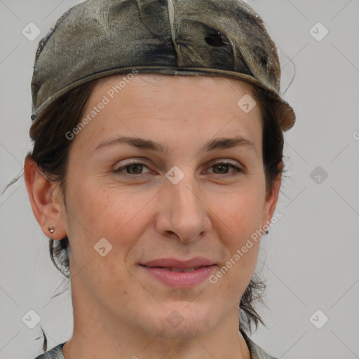 Joyful white adult female with short  brown hair and grey eyes