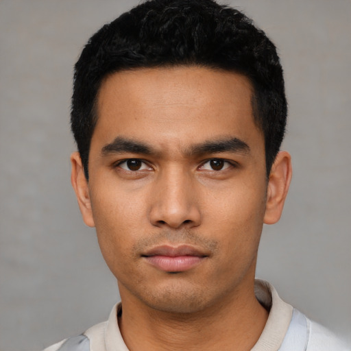 Neutral asian young-adult male with short  black hair and brown eyes