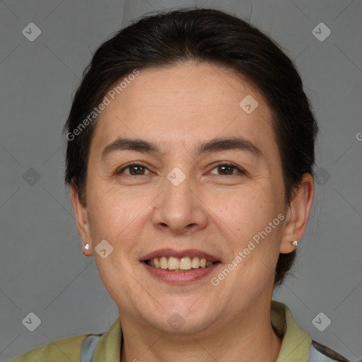 Joyful white adult female with short  brown hair and brown eyes