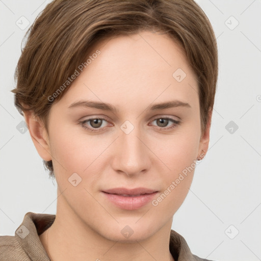 Joyful white young-adult female with short  brown hair and grey eyes