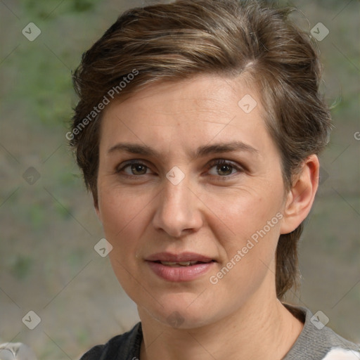 Joyful white adult female with medium  brown hair and brown eyes