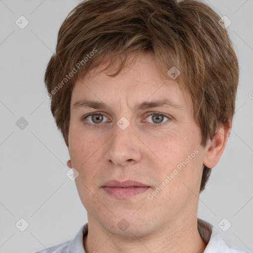 Neutral white adult male with short  brown hair and grey eyes