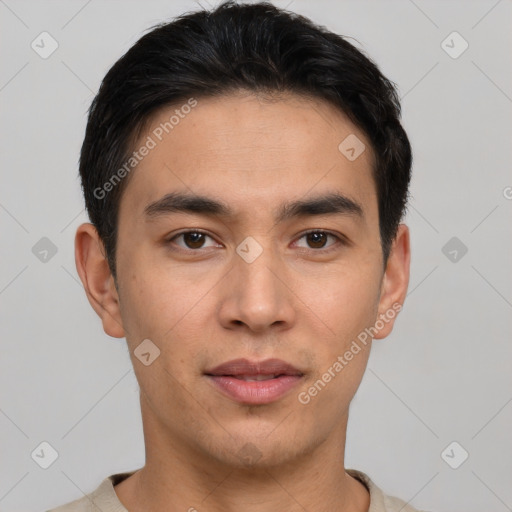 Joyful white young-adult male with short  black hair and brown eyes