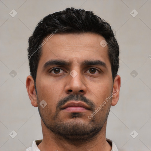 Neutral white young-adult male with short  black hair and brown eyes