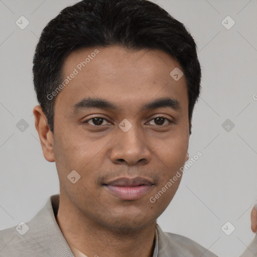 Joyful latino young-adult male with short  black hair and brown eyes