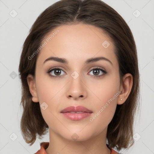 Neutral white young-adult female with medium  brown hair and brown eyes