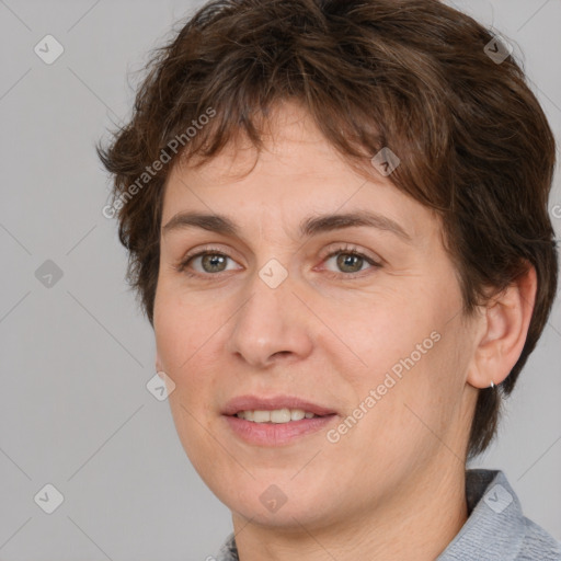 Joyful white adult female with short  brown hair and brown eyes