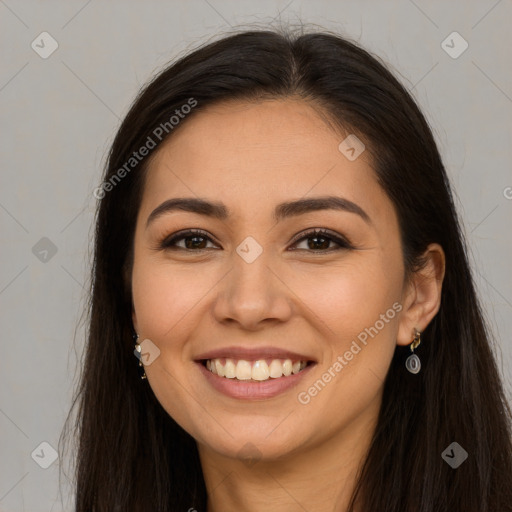 Joyful white young-adult female with long  brown hair and brown eyes